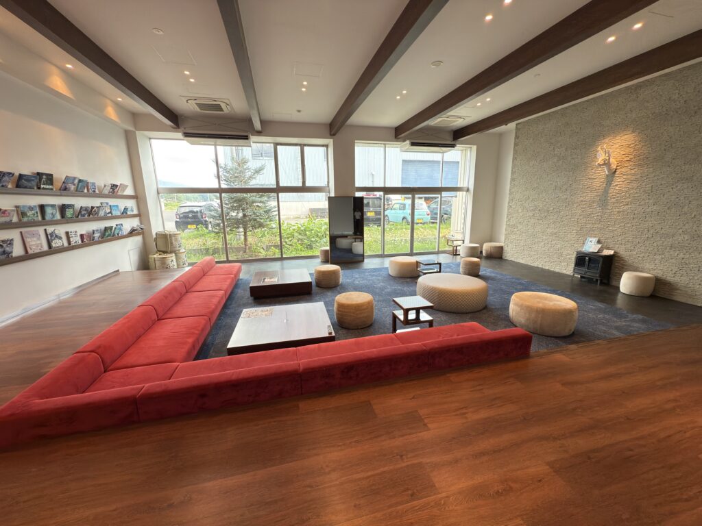nterior of Torifito Hotel & Pod Niseko with modern lounge, Northern Kitchen restaurant, and breakfast buffet in central Kutchan