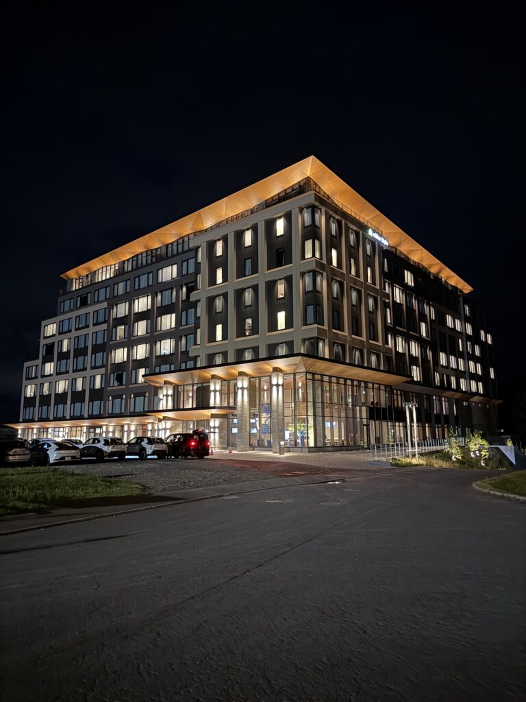 Night view of Hotel Nikko Style Niseko HANAZONO luxury resort with Mountain Lights illumination art installation in free zone — top Niseko Hokkaido hotel stay 2025