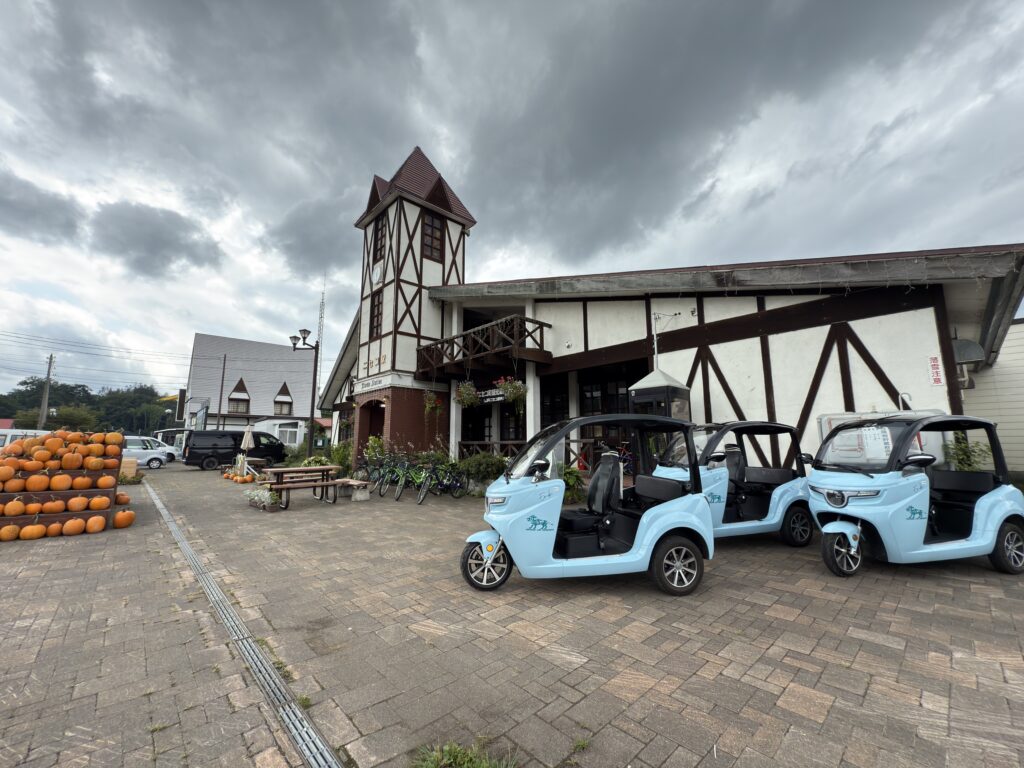 There is a rental tuk-tuk in front of Niseko Station