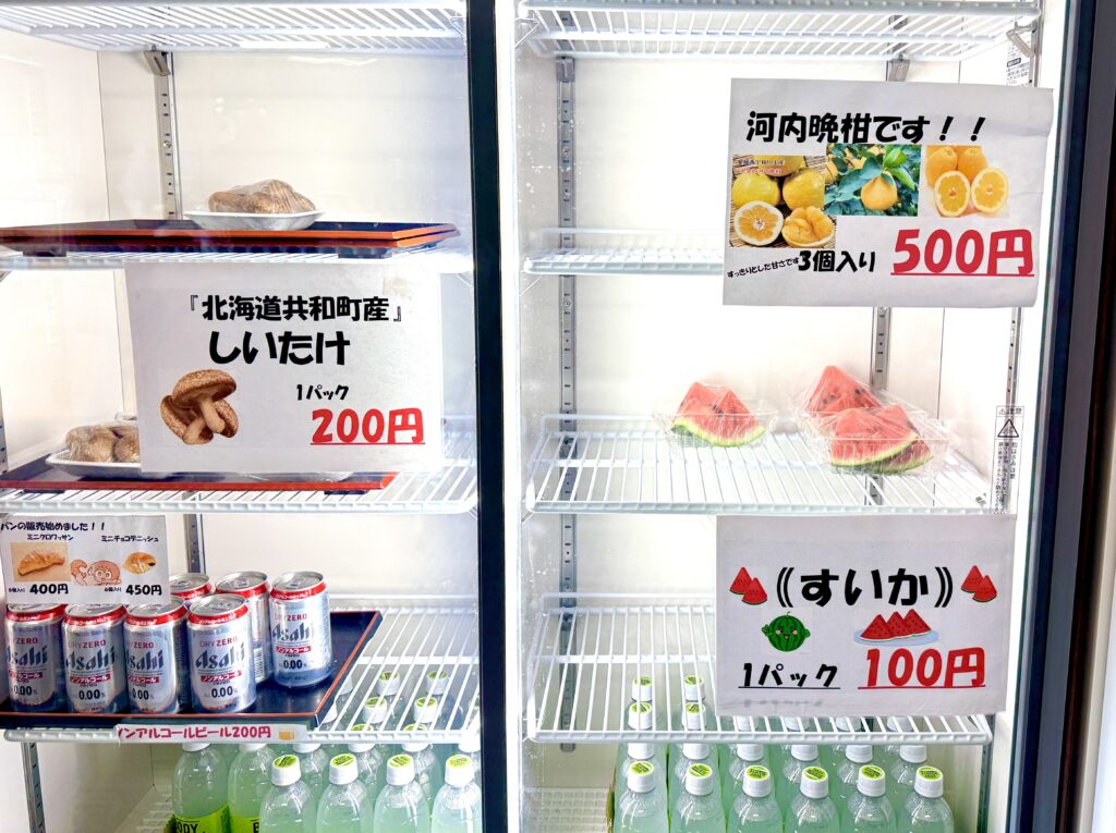 Refrigerator with Kyowa shiitake mushrooms, watermelon packs and local drinks at Waisu Onsen