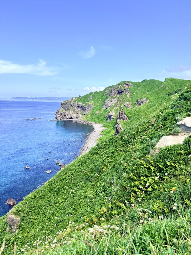 Cape Kamui tip with green ridges and the Shakotan Blue Sea of Japan