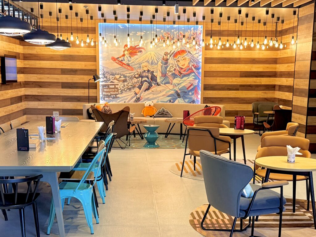 Colourful lounge and timber interior at Moxy Niseko Village